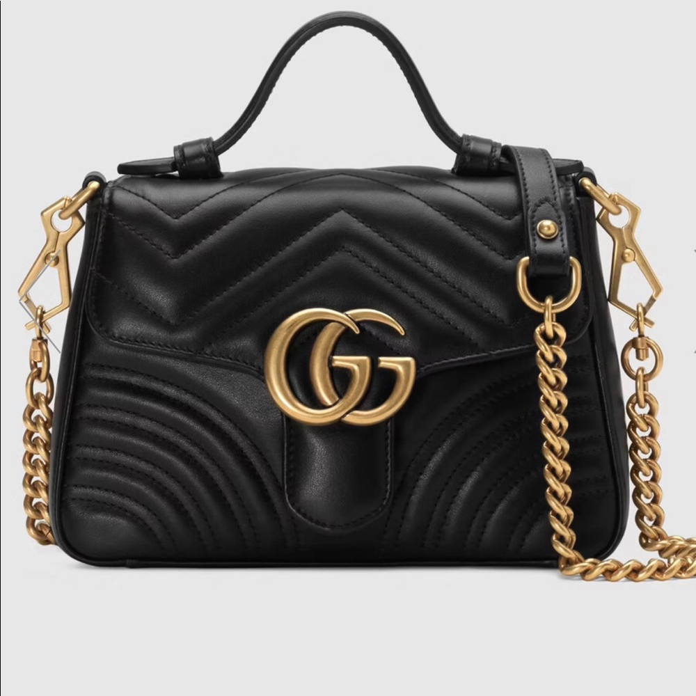 Gucci Marmot top handle mini bag